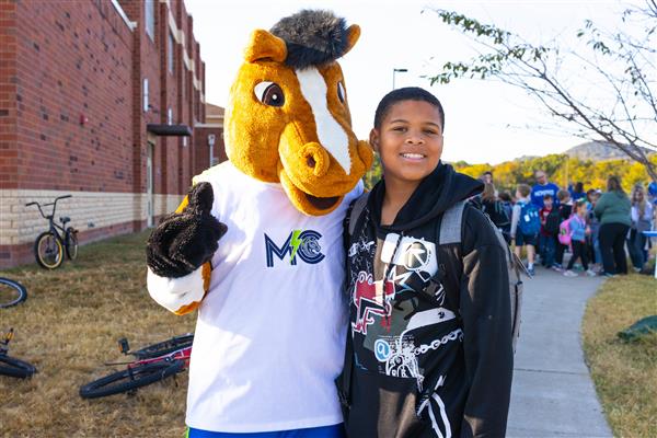 Students walking to school for National Walk to School Day.